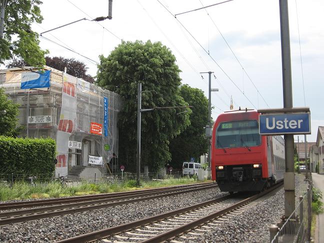 Uster sign with train
