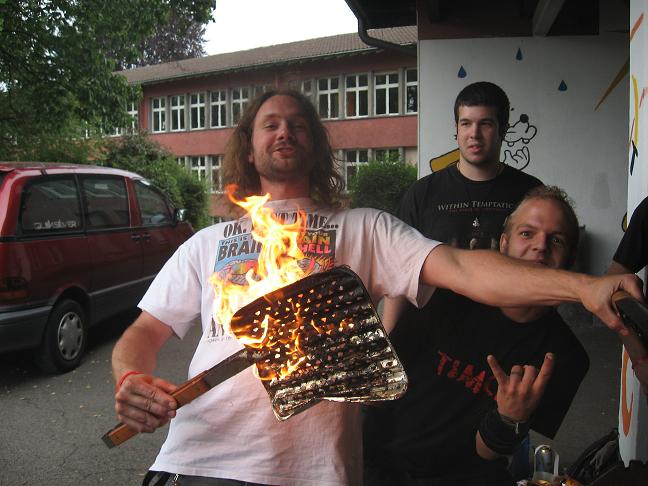 Friday BBQ - Tom holding fire