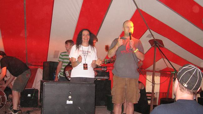 Cindy on Sanctuary Stage with Matt from Bombworks Records.