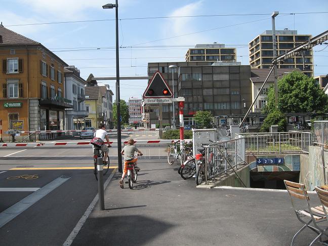 Uster--waiting for train to pass, or use tunnel to get to other side of street.