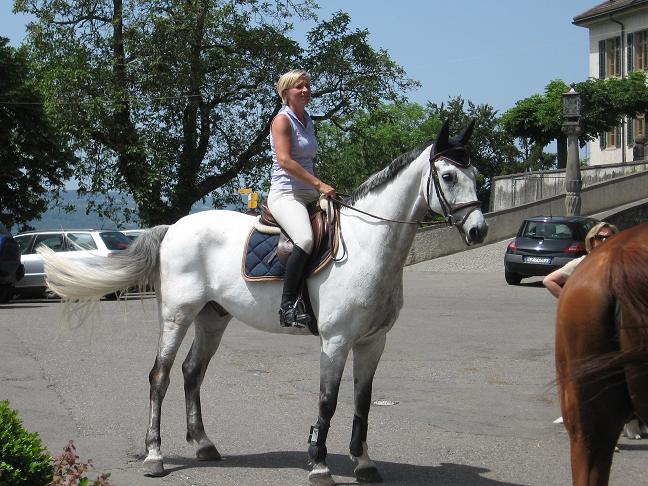 Lady mounted her horse for Sunday afternoon ride.